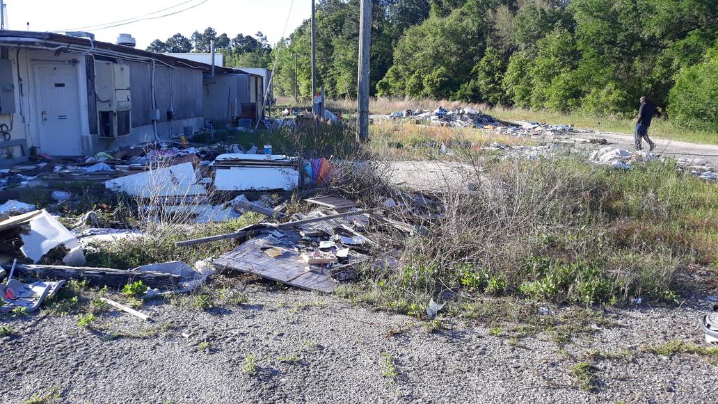 Debris Outside Of A House Junk Removal Service Something Old Salvage 6505 North W Street Pensacola FL 32505 850 758 9900 www.somethingoldsalvage.com